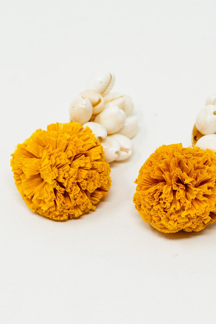 Earrings With Cream Seashells and Yellow Pom Poms