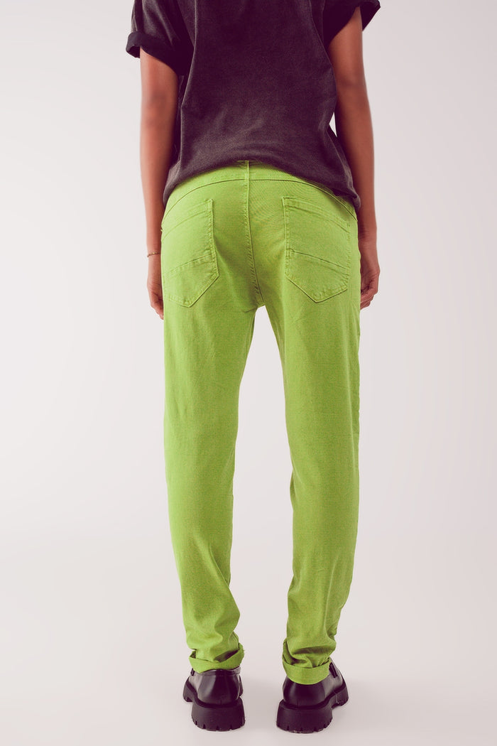 Exposed buttons skinny jeans in green - Coloured Jeans