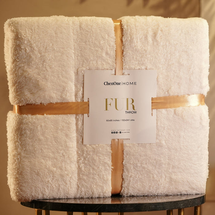 Oat milk faux fur winter throw blanket, folded with soft plush texture and clean edges