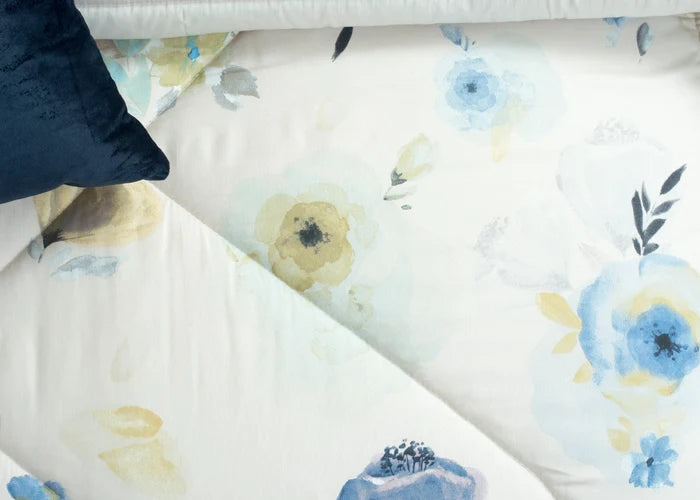 Cream comforter with blue and yellow floral print