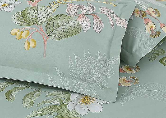 Sea grass cotton pillow cover close-up with large leaf and blossom print