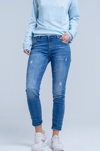Ankle jeans with rip and repair - Denim