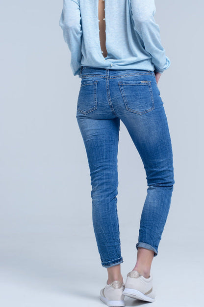 Ankle jeans with rip and repair - Denim