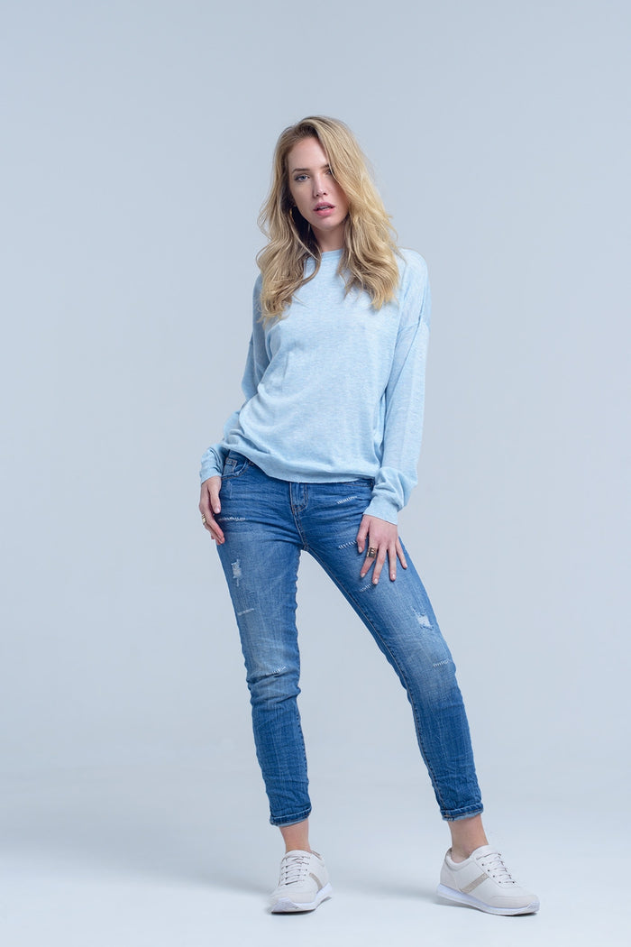 Ankle jeans with rip and repair - Denim