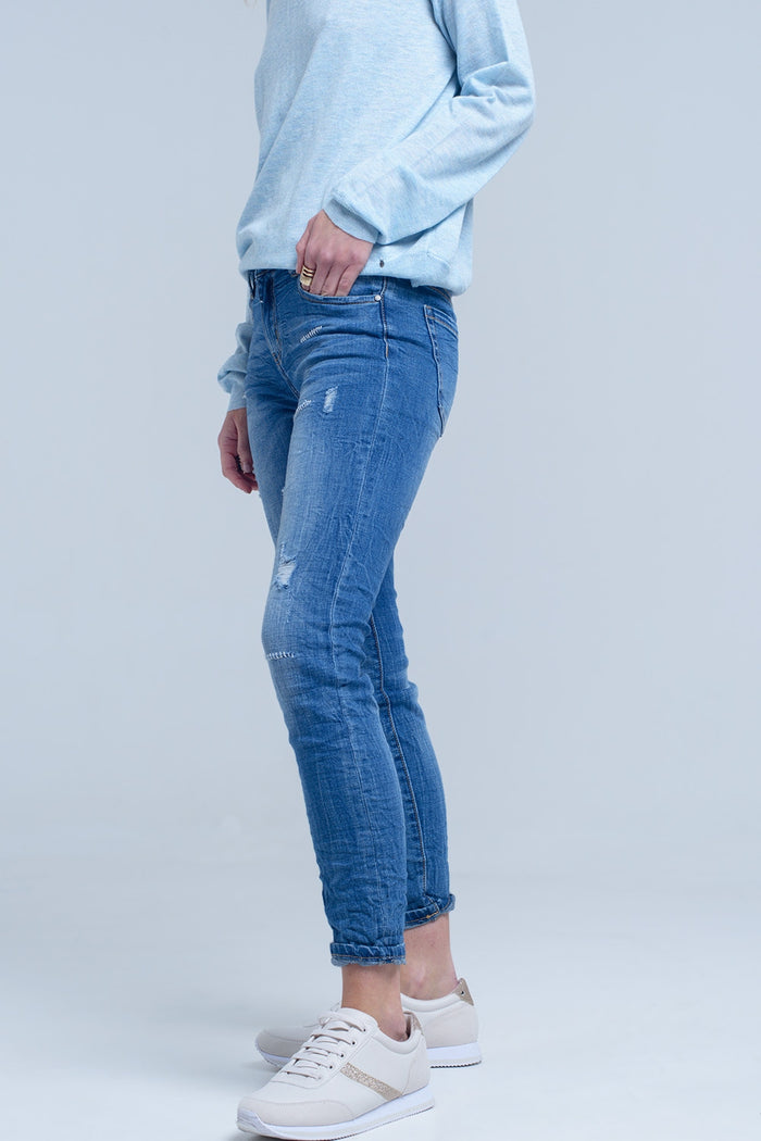 Ankle jeans with rip and repair - Denim