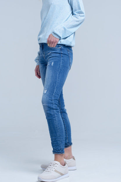 Ankle jeans with rip and repair - Denim