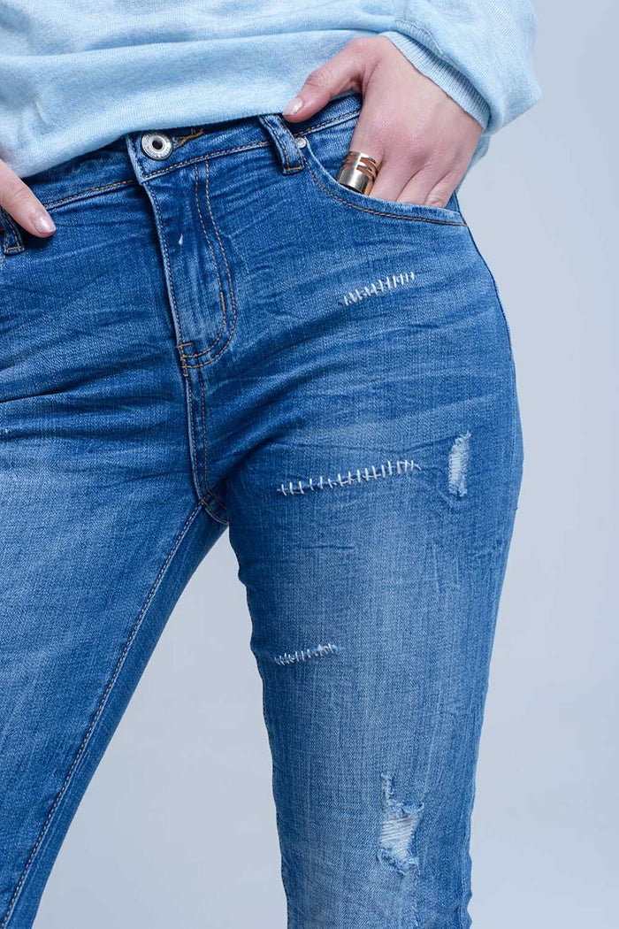 Ankle jeans with rip and repair - Denim