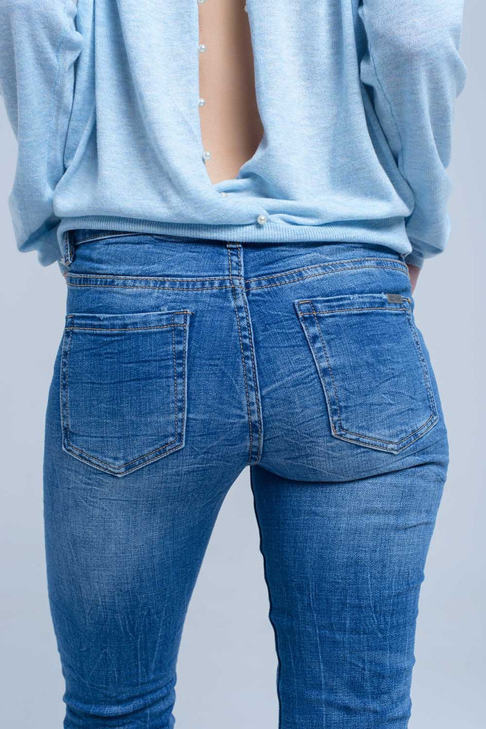Ankle jeans with rip and repair - Denim