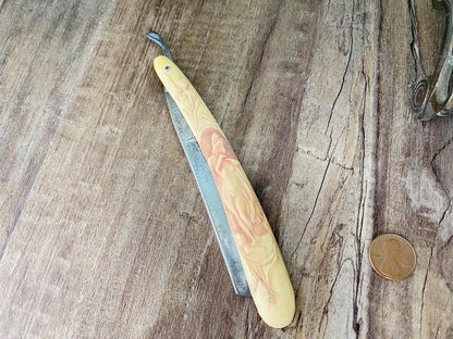 Antique Straight Edge Celluloid Razor at Duckwells