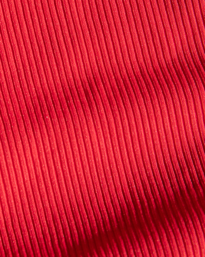 Close-up of pink-red ribbed fabric used in the LSPACE Pout Color.