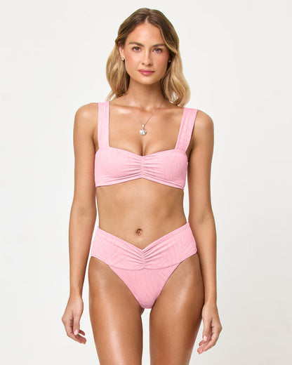 LSPACE Bardot bikini bottom in Pink Sugar, front view on model.