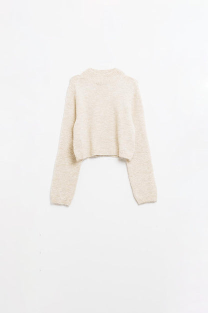 Beige jersey with long sleeves and open back detail