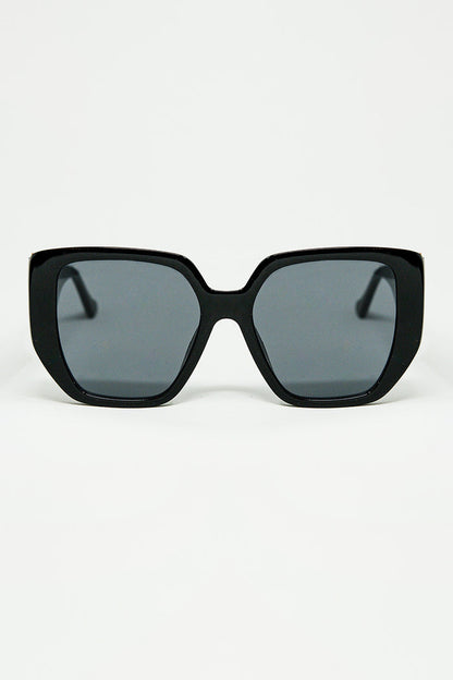 Black pin-up style sunglasses with geometric design and cat eyes