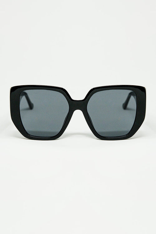Black pin-up style sunglasses with geometric design and cat eyes