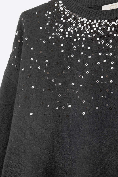 black soft knit sweater embellished with sequins on the front
