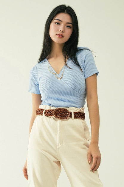 Blue sweater with crossed front and V-neck