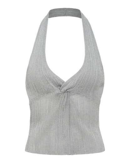 Off-model view of the LSPACE Callie Halter in metallic silver, showing the deep V-neckline with a twist-knot front detail and halter neck strap in ribbed metallic silver knit fabric.