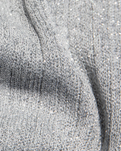 Close-up of the LSPACE Callie Halter in metallic silver, showcasing the ribbed knit fabric with silver metallic lurex thread throughout.