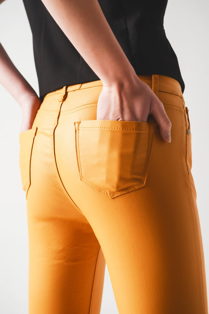 Coated pants in orange - trousers