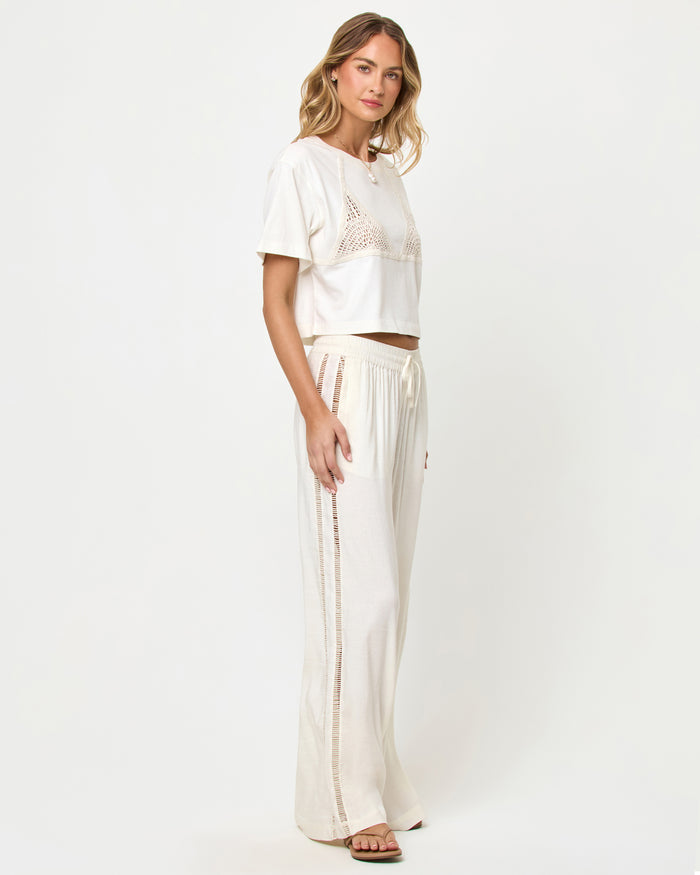 LSPACE At Your Leisure pant and Core Top in cream-natural, side view on model.
