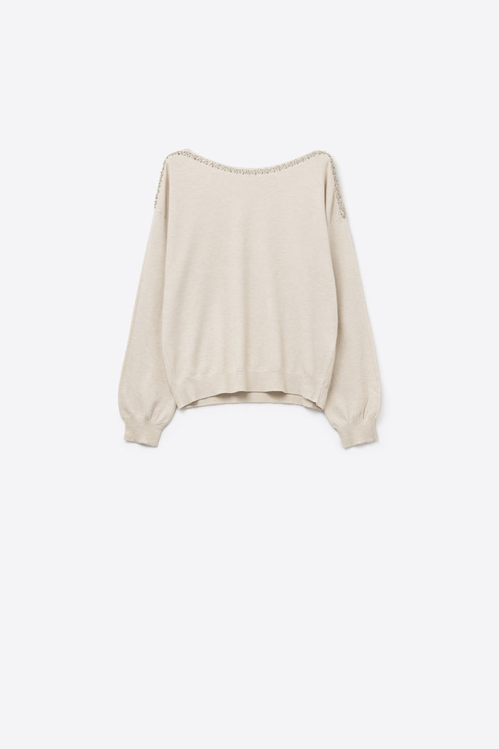 cream fine knit sweater with a boat neck and rhinestone detail