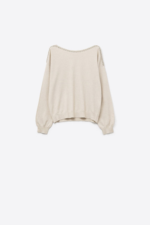 cream fine knit sweater with a boat neck and rhinestone detail