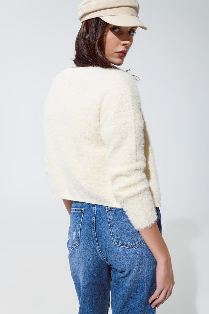 cream fluffy cardigan with silver bottoms
