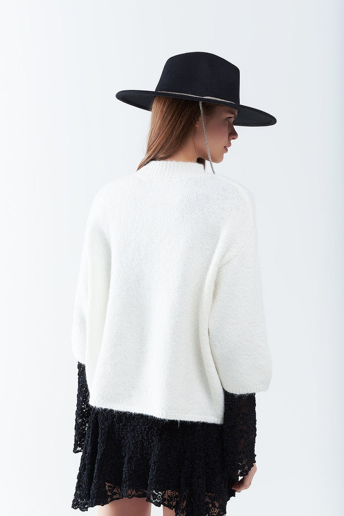 cream Fluffy sweater with three-quarter sleeves and round neck