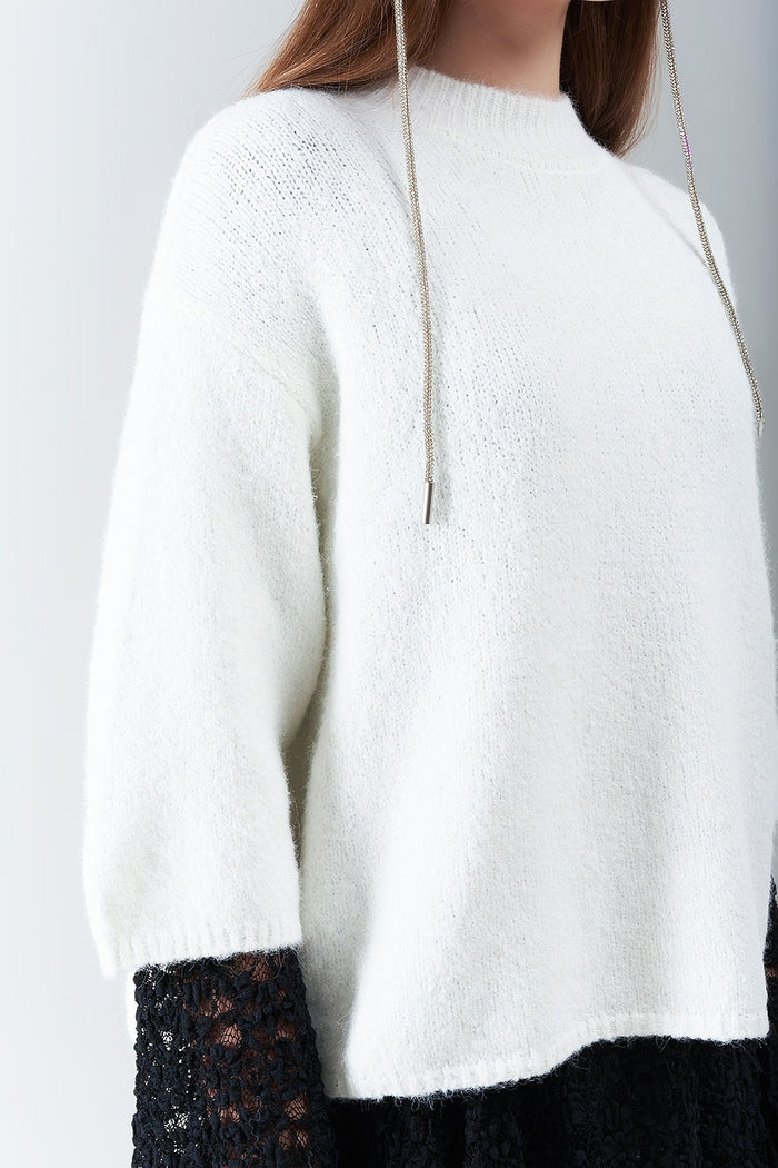 cream Fluffy sweater with three-quarter sleeves and round neck