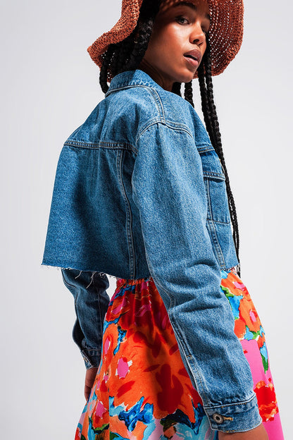 Cropped denim jacket with raw hem in mid wash