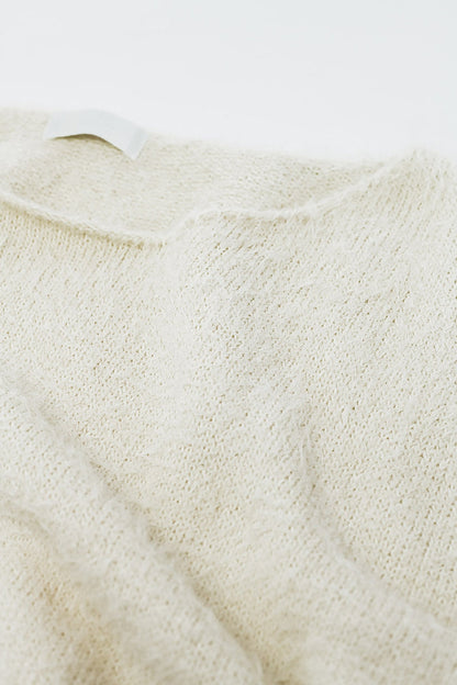 cropped fluffy sweater in cream fitted at the waist