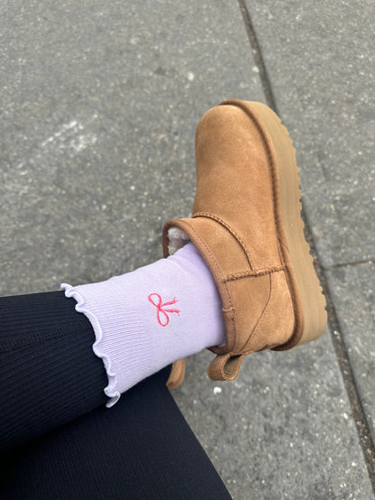 Custom embroidered ruffle grips