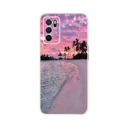 a pink sunset on the beach with palm trees and a pink sky