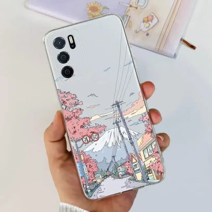 a woman holding a phone case with a drawing of a city