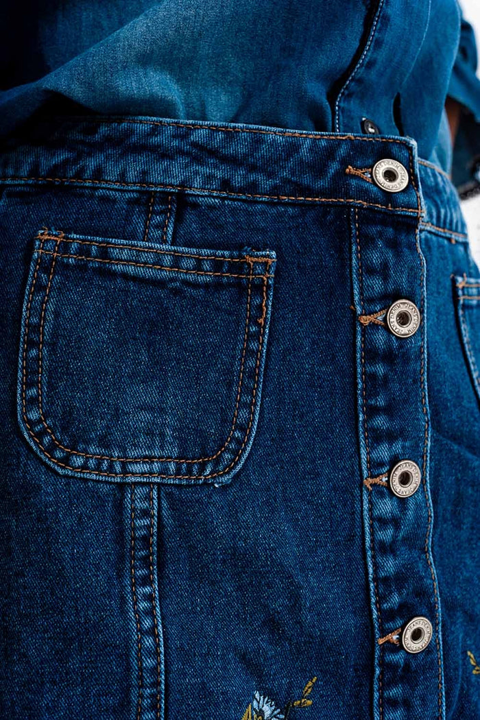 Denim skirt with flower embroidery and front buttons
