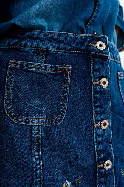 Denim skirt with flower embroidery and front buttons
