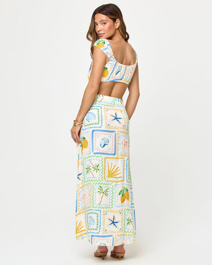 LSPACE Ever Top and Every Wrap Skirt in Wish You Were Here print, back view on model.