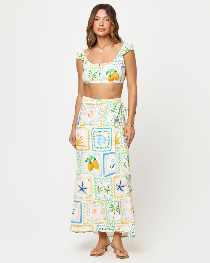 Wish You Were Here | Badge:New Arrival_#B2AC88_#ffffff'
LSPACE Ever Top and Every Wrap Skirt in Wish You Were Here print, front view on model.