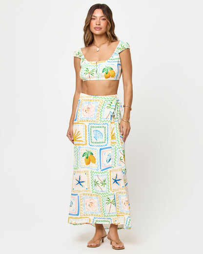 Wish You Were Here | Badge:New Arrival_#B2AC88_#ffffff'
LSPACE Ever Top and Every Wrap Skirt in Wish You Were Here print, front view on model.