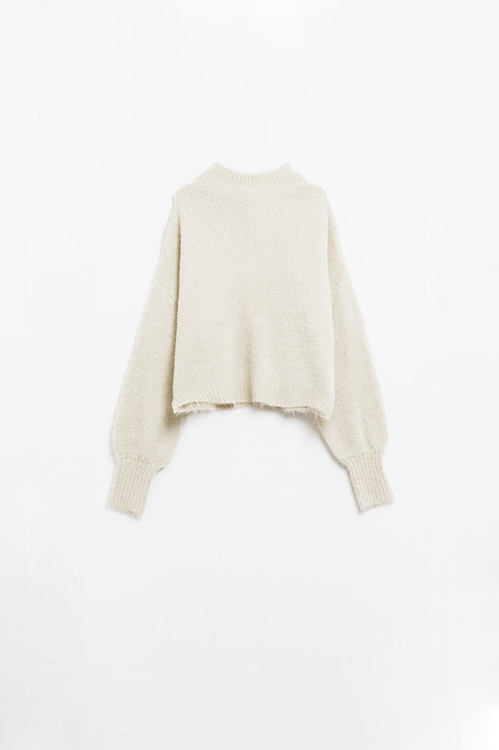 Fluffy beige sweater with high neck and balloon sleeves