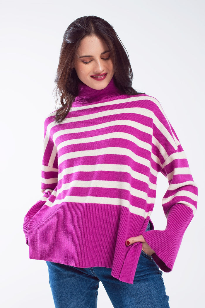 Fuchsia oversized trutleneck sweater with white stripes and splits on the side