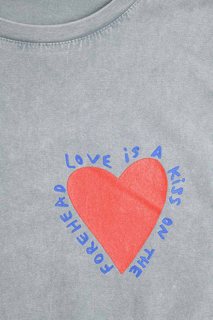 Grey T-shirt featuring a heart design on both the front and back - top