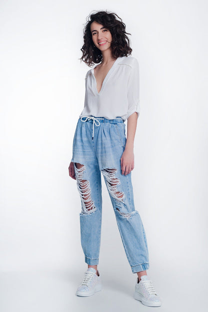 Heavily ripped boyfriend jeans in light denim - Denim