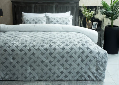 Quilted winter bedding set with light textured chevron pattern and matching pillowcases