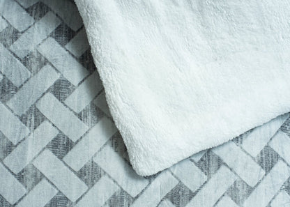 Soft quilted bedding set fabric with light textured chevron and plush top layer