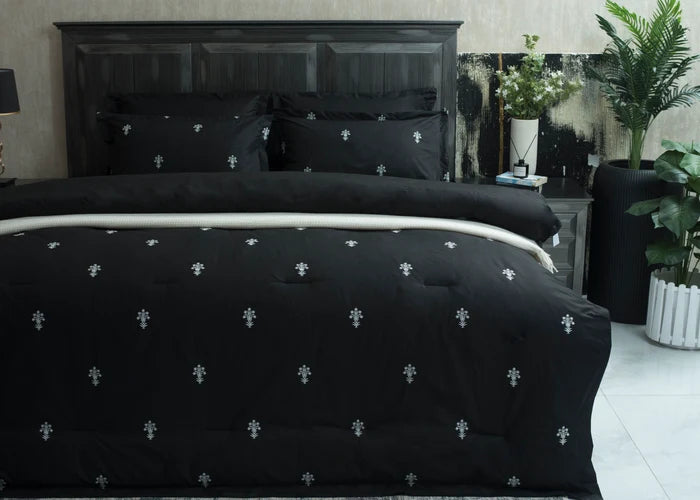 6-piece black cotton percale comforter set with white floral cross pattern, full bed view
