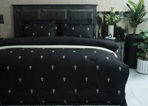 6-piece black cotton percale comforter set with white floral cross pattern, full bed view