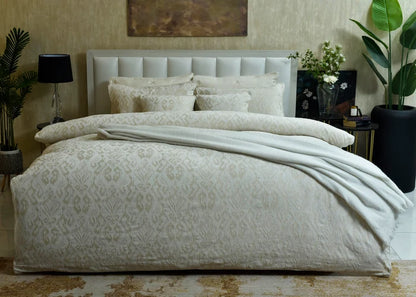 Beige jacquard duvet cover set with matching pillows and textured bedding
