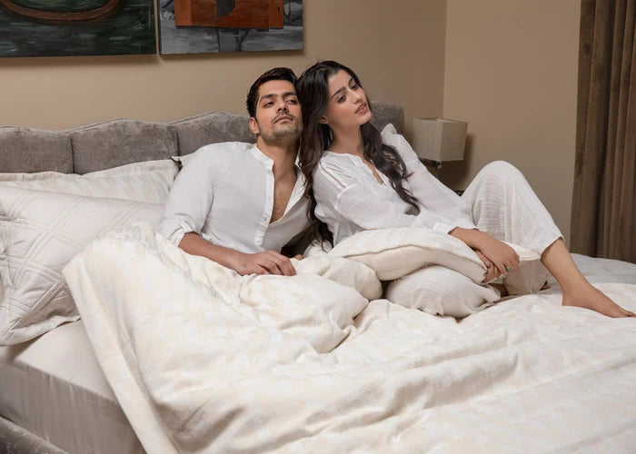 Light beige duvet cover set with matching pillowcases, styled on bed