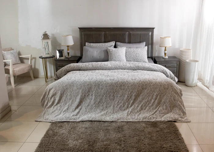 Grey duvet cover with textured pattern, paired with matching pillow shams